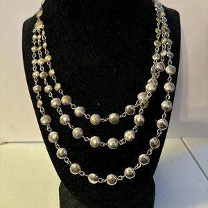 Silver Multistrand disk necklace